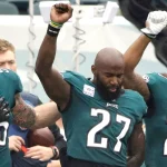 180606-malcolm-jenkins-chris-long-rodney-mcleod-protest-eagles-ew-141p