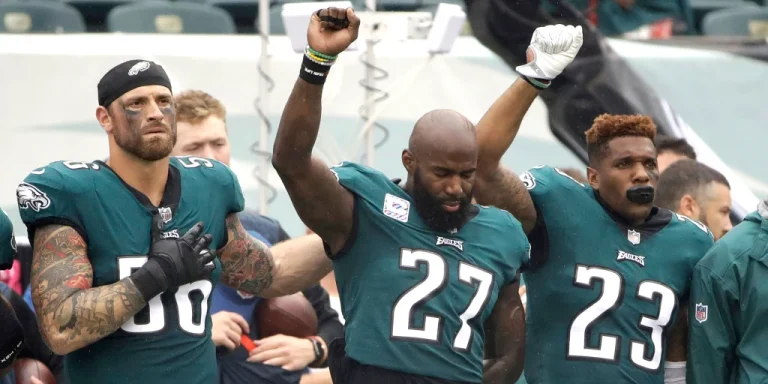 180606-malcolm-jenkins-chris-long-rodney-mcleod-protest-eagles-ew-141p