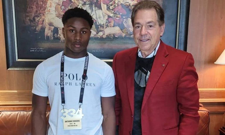 Anthony-Rodgers-takes-picture-with-Saban-during-visit
